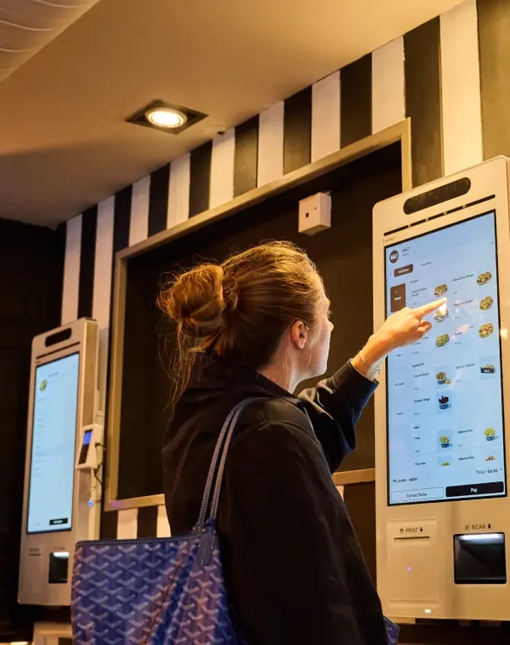 Customer ordering at a self-service kiosk