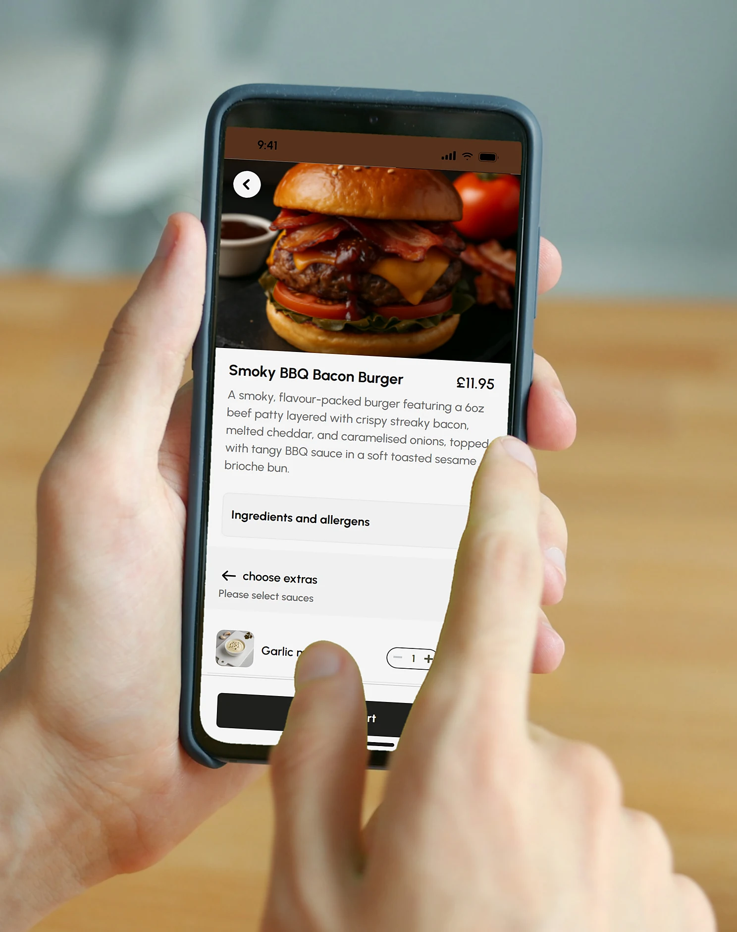 Customer choosing extras and sauces for a burger on their phone